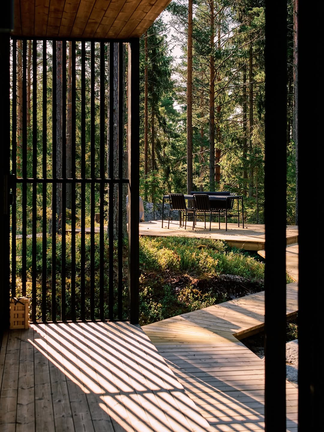 Dining area with natural light and forest view