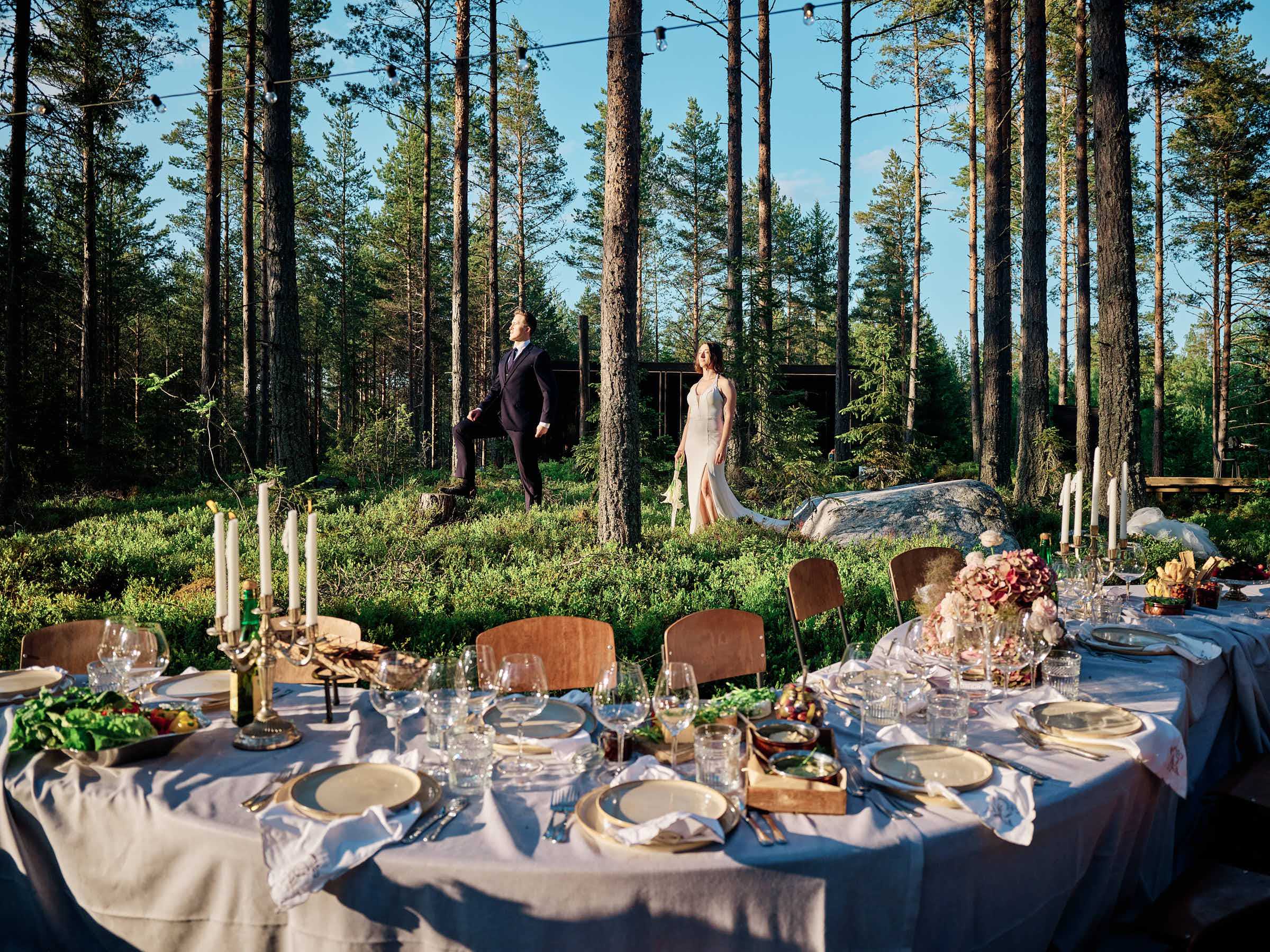 Couple with horses on a forest path in Hälsingland, Sweden